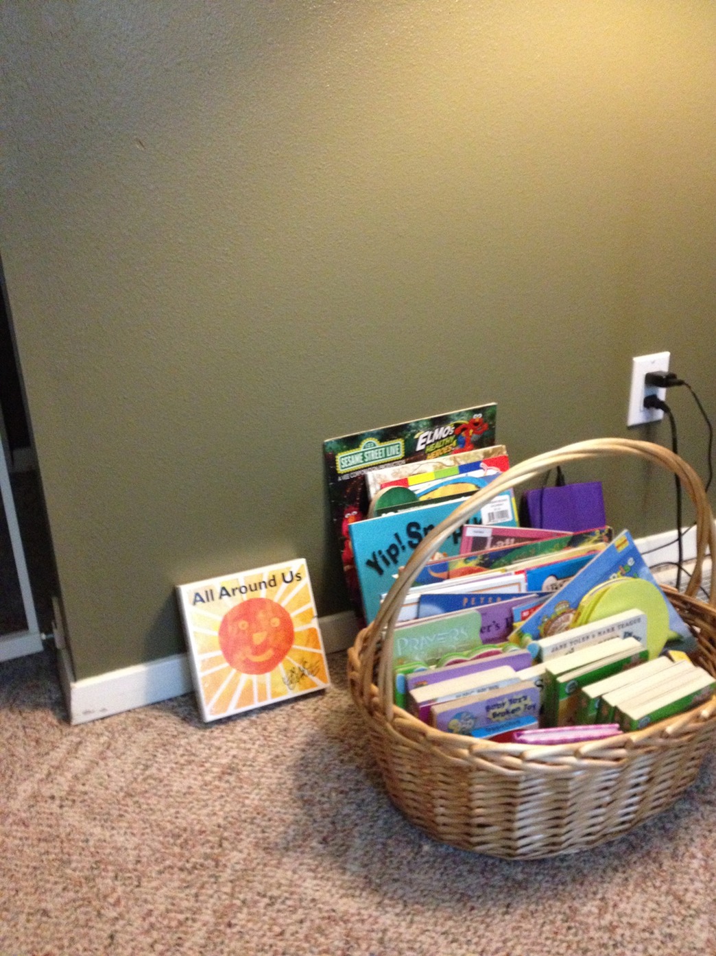small book basket, but children can bring books from other areas into